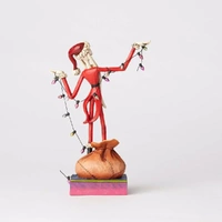 Wrapped Up in Christmas Spirit Figurine
